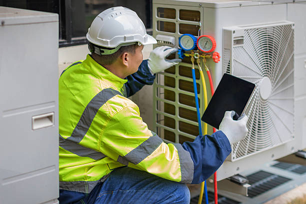 Professional Hvac Installation technician working in Raynham Center, MA
